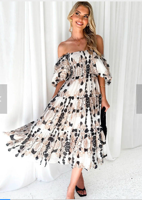 Abito floreale alla moda con scollo a spalle scoperte