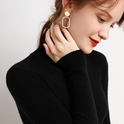 Maglione da donna in lana a collo alto